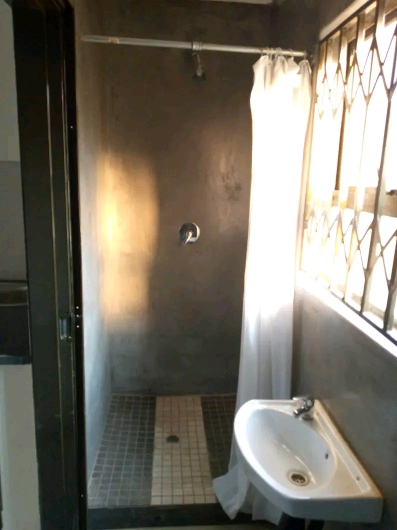 Mini kitchen
wardrobe 
own shower 
and toi  in Protea North
