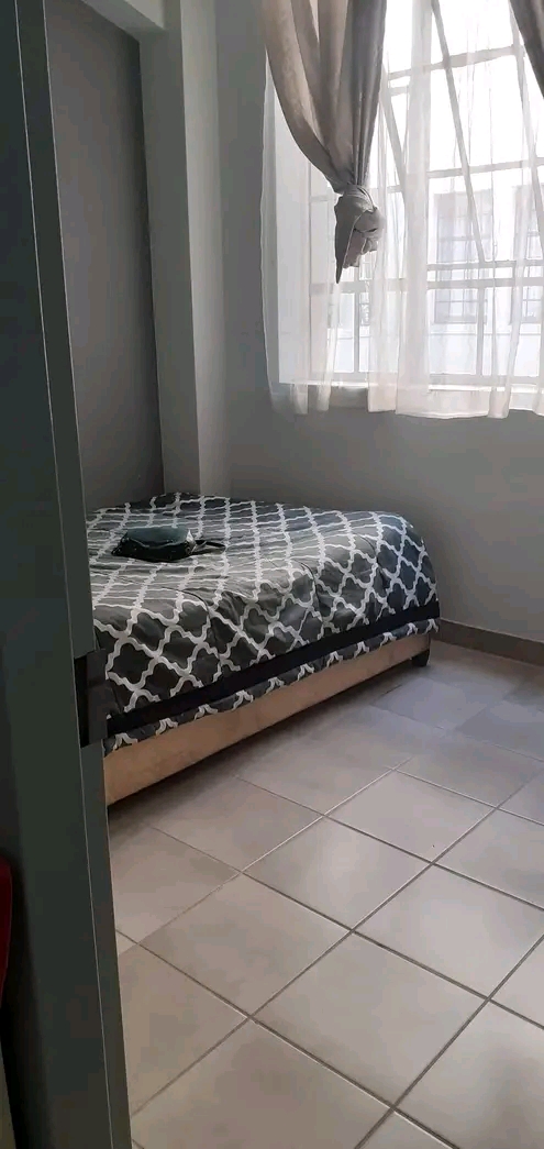 A clean room in a 2 bedroom flat available  f  in Johannesburg