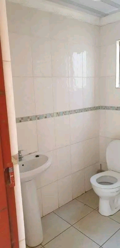 Room with outside toilet and shower and built  in Protea Glen