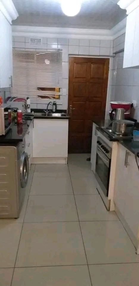 A room to rent sharing a 3 bedroom unit in ke  in Kempton Park