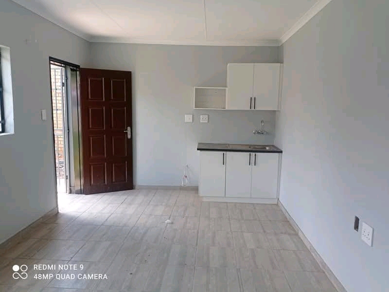 Here is a very nice fitted bachelor in a quie  in Kempton Park
