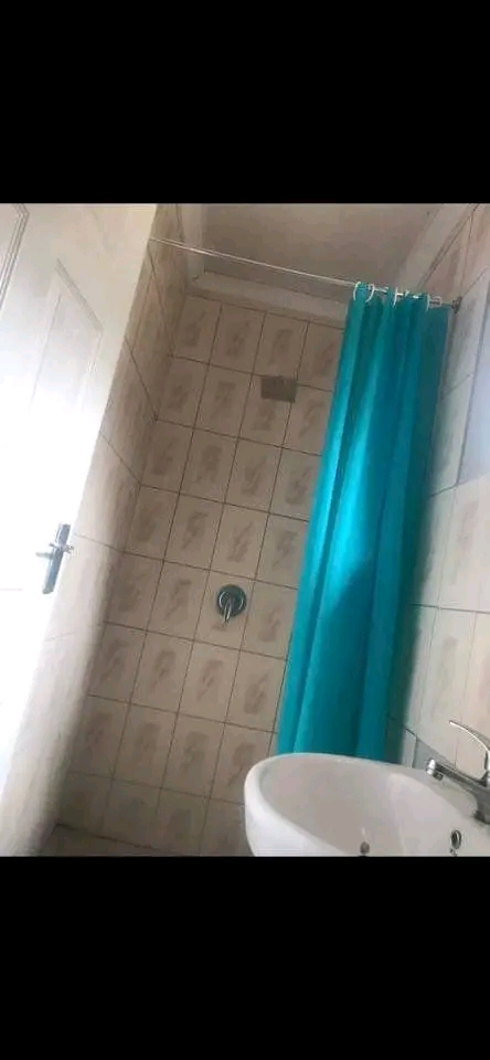 An open-concept bachelor pad , accompanied by  in Dobsonville