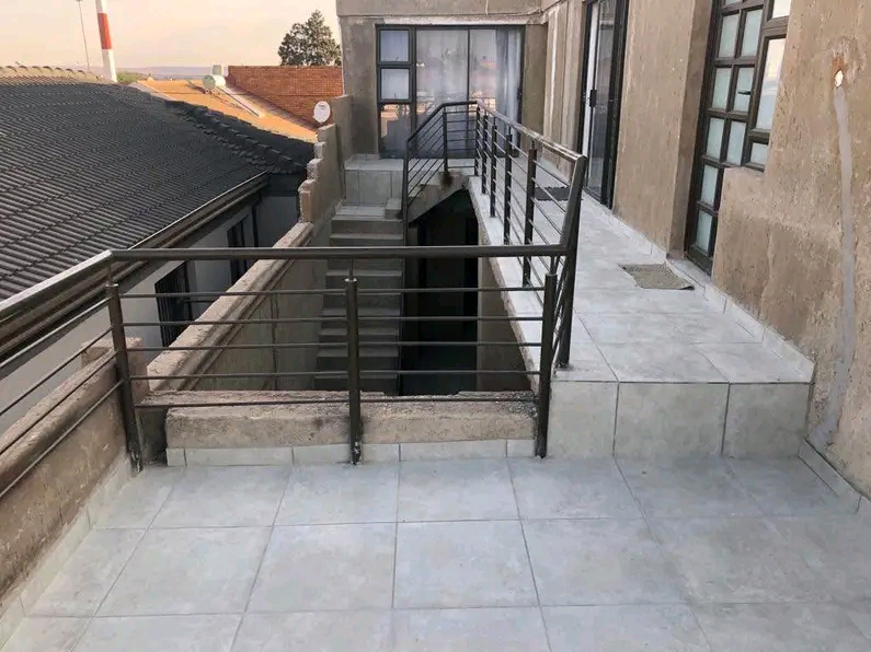 Mini kitchen
wardrobe 
own shower 
and toi  in Protea North