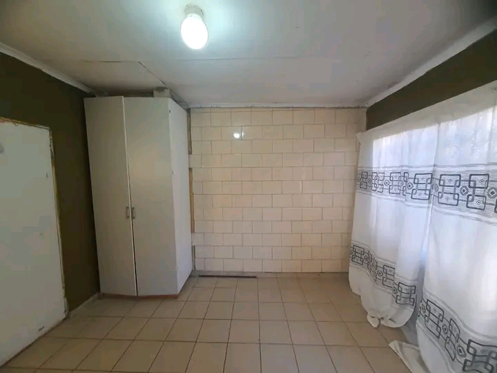Bachelor room to rent at ext 20 with sink, wa  in Protea Glen