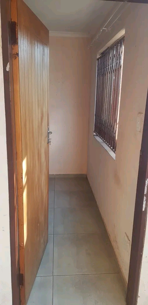 Room to rent ext 16. secured yard. shared toi  in Protea Glen