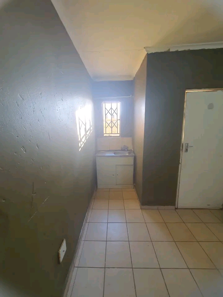 Bachelor room to rent at ext 20 with sink, wa  in Protea Glen