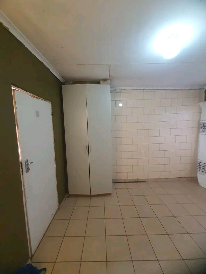 Bachelor room to rent at ext 20 with sink, wa  in Protea Glen