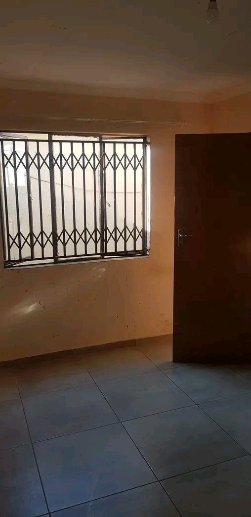 Room to rent ext 16. secured yard. shared toi  in Protea Glen