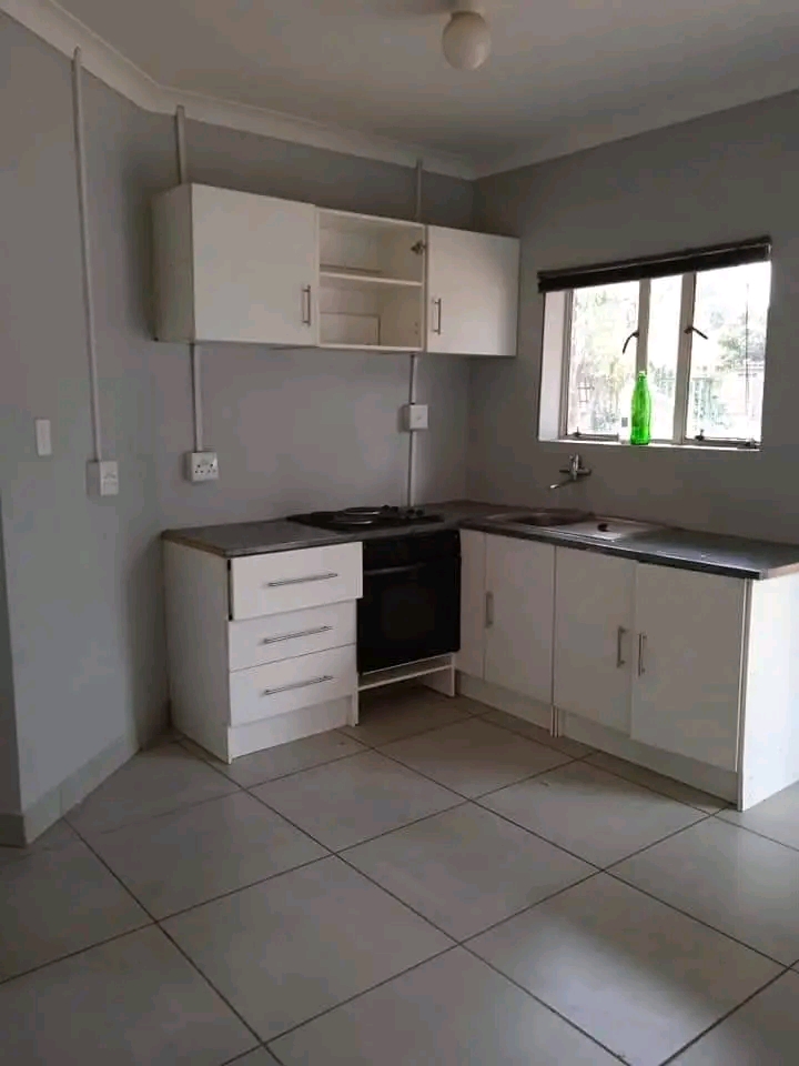 2 bedroom cottage kitchen with cupboards, sin  in Old Birch Acres