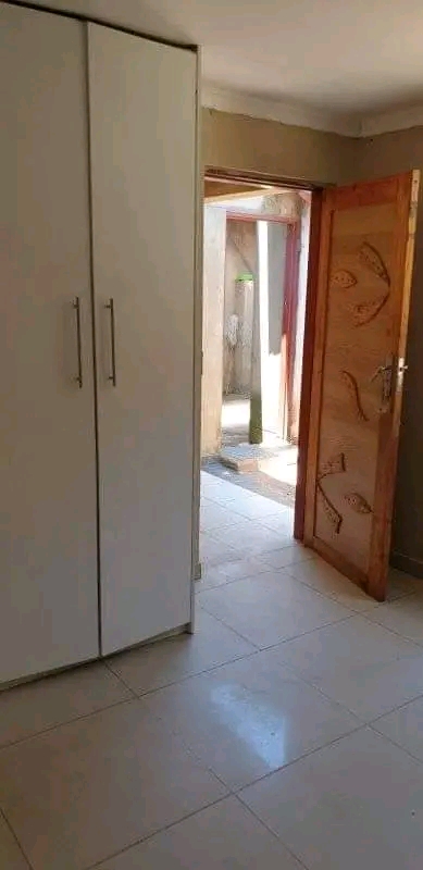 Room with outside toilet and shower and built  in Protea Glen