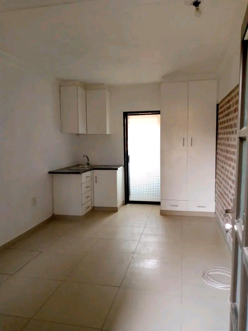 Mini kitchen
wardrobe 
own shower 
and toi  in Protea North