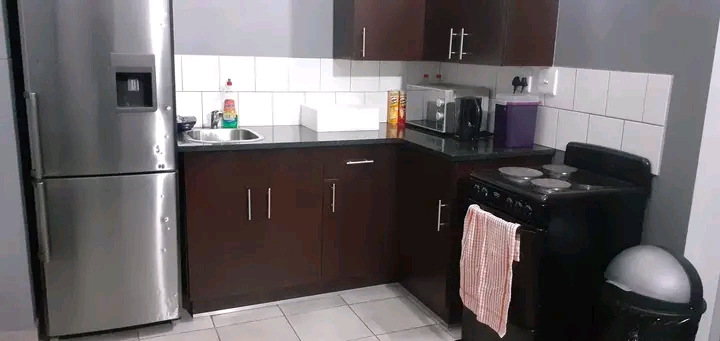 A clean room in a 2 bedroom flat available  f  in Johannesburg