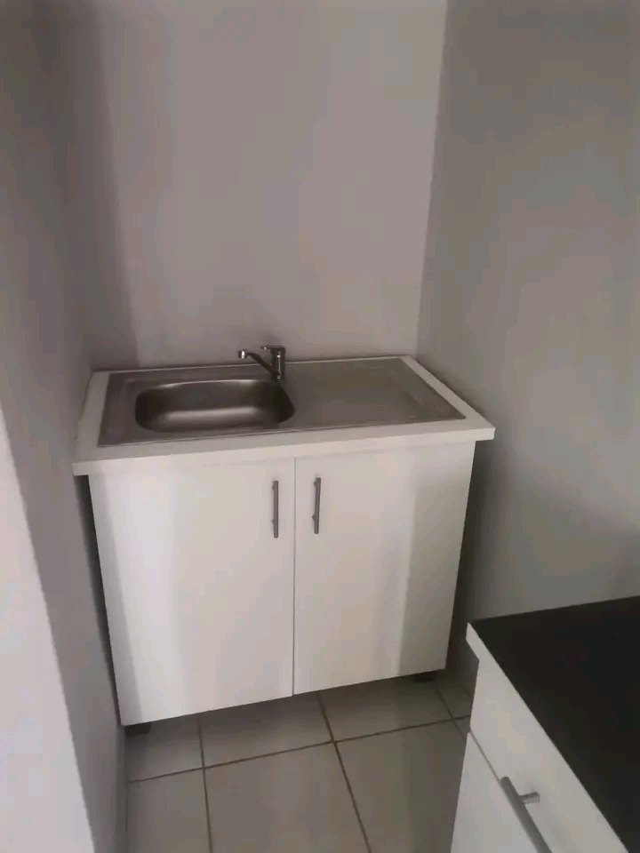 A very nice open bachelor with a sink and a w  in Birch Acres