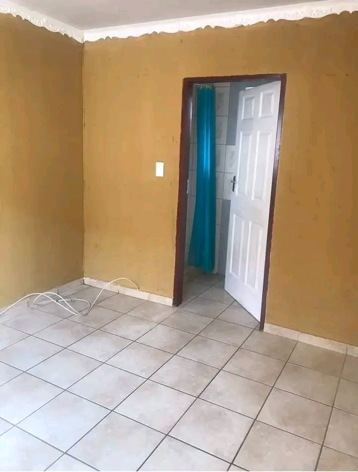 An open-concept bachelor pad , accompanied by  in Dobsonville