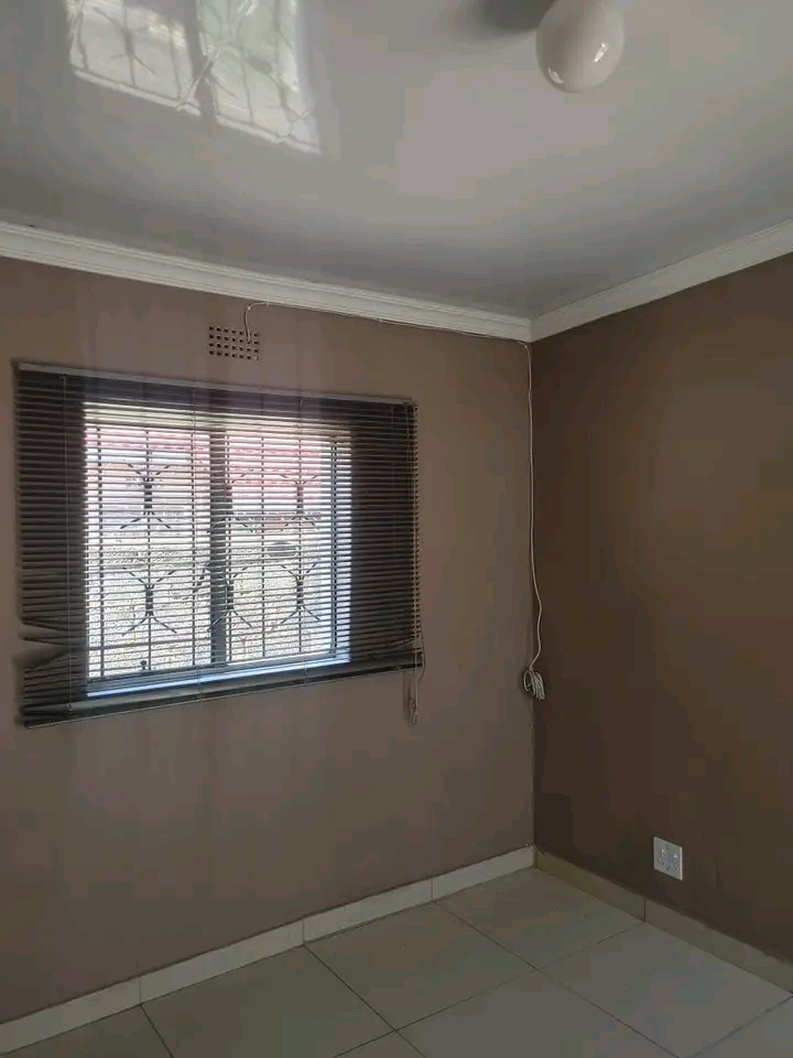 A beautiful spacious room with an outside sho  in Pimville