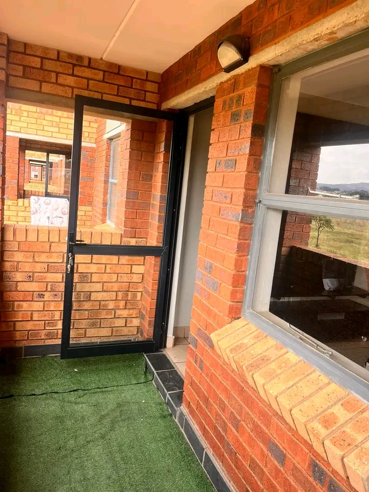 2nd floor unit
open plan lounge and fitted k  in Kibler Park