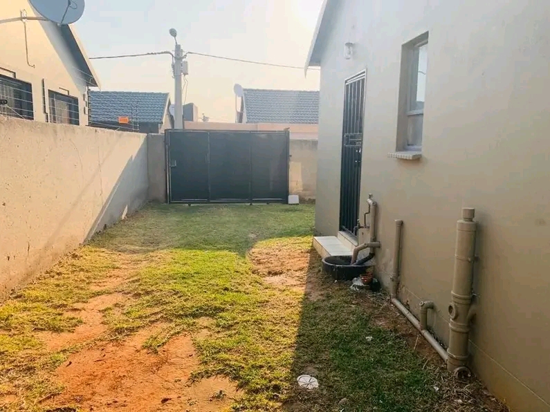 This semi detached 2 bedrooms house with open  in Roodepoort