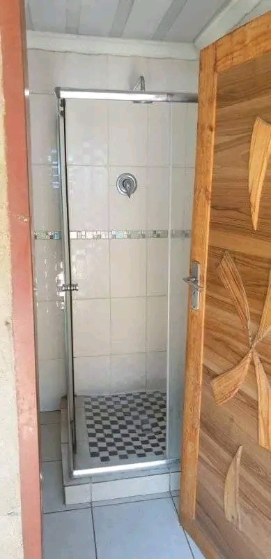 Room with outside toilet and shower and built  in Protea Glen