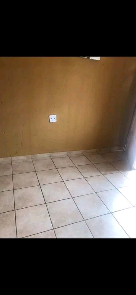 An open-concept bachelor pad , accompanied by  in Dobsonville