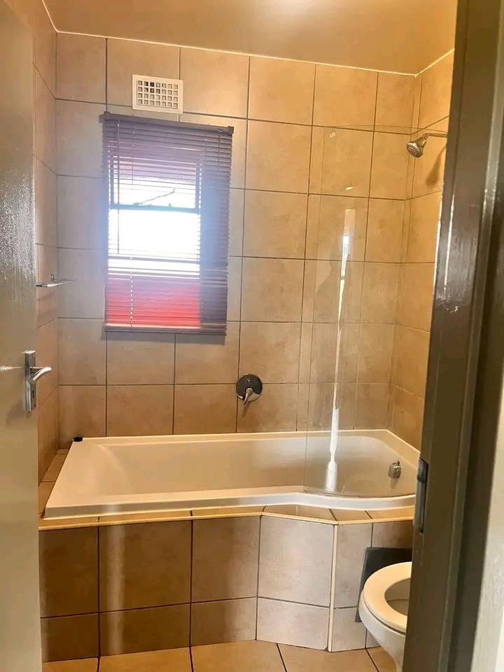 2nd floor unit
open plan lounge and fitted k  in Kibler Park
