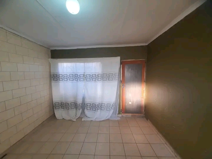 Bachelor room to rent at ext 20 with sink, wa  in Protea Glen