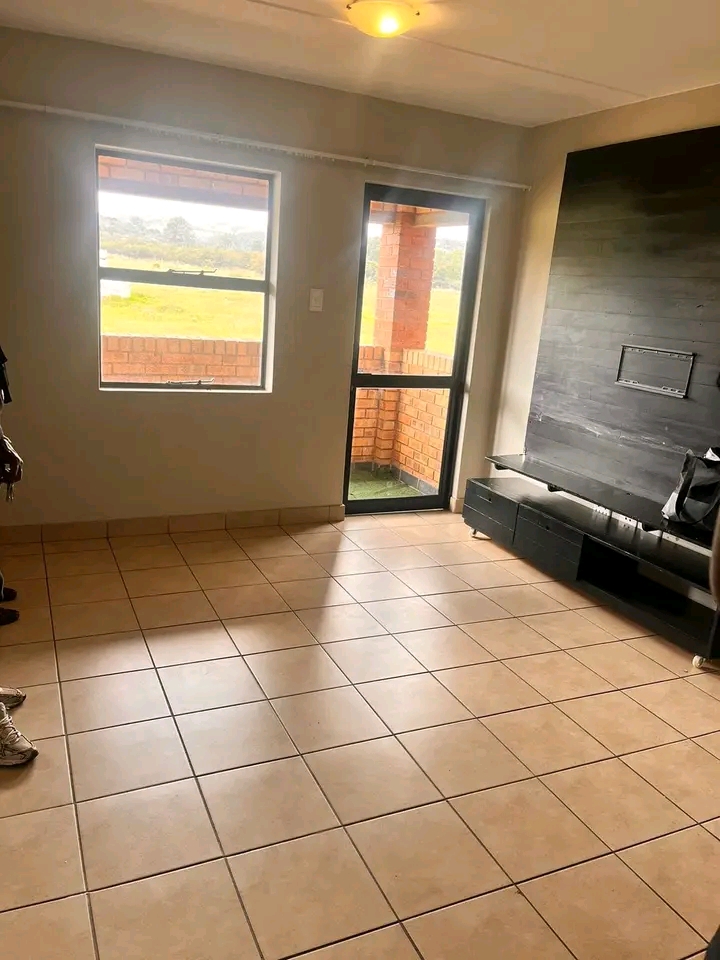 2nd floor unit
open plan lounge and fitted k  in Kibler Park