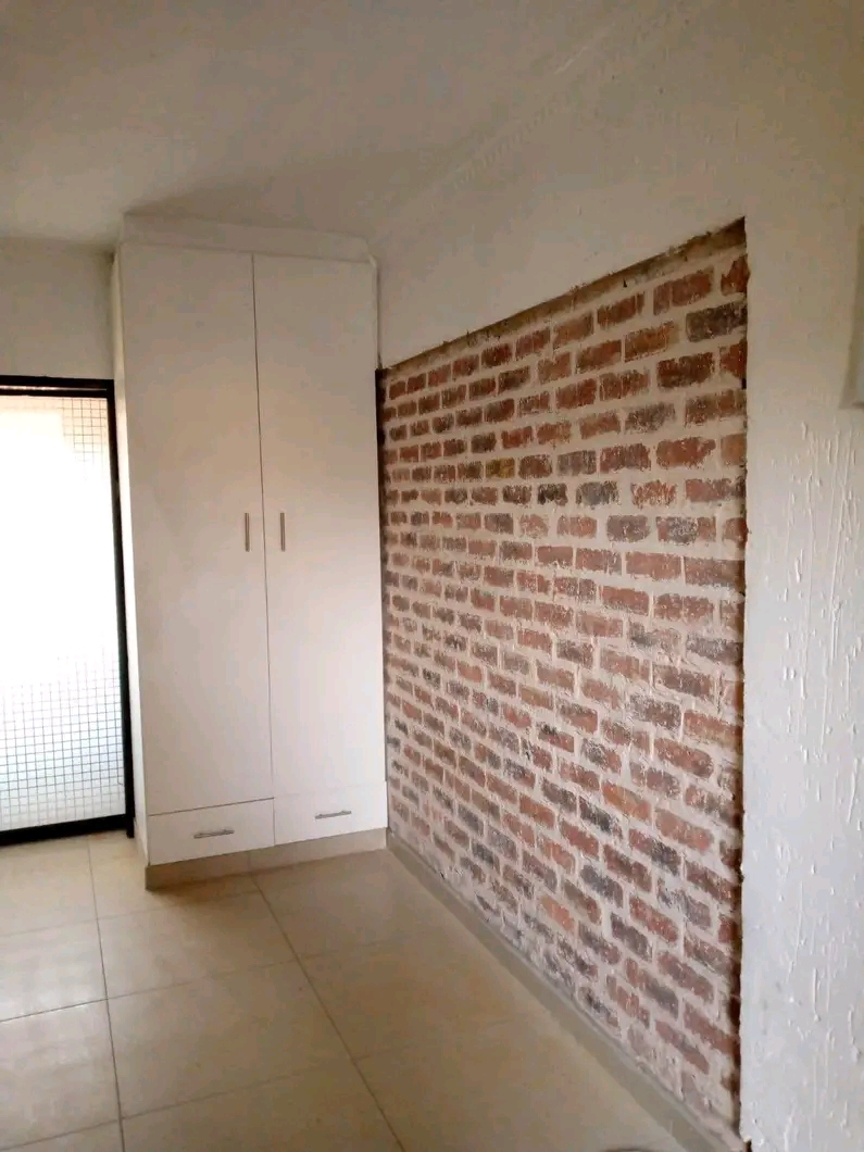 Mini kitchen
wardrobe 
own shower 
and toi  in Protea North