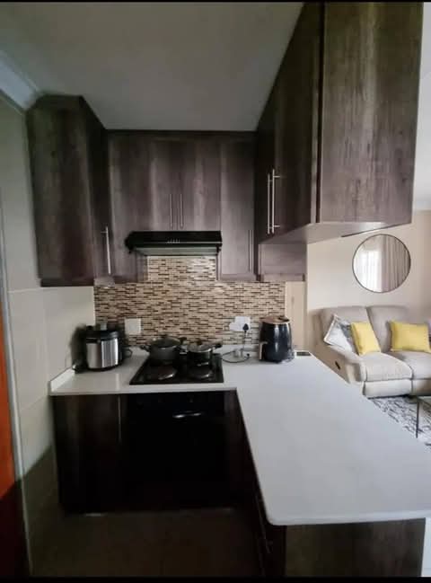 A well maintained 2 bedroom house with built-  in Clayville