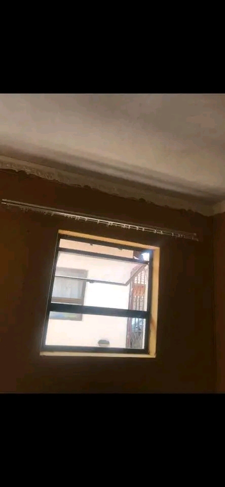 An open-concept bachelor pad , accompanied by  in Dobsonville