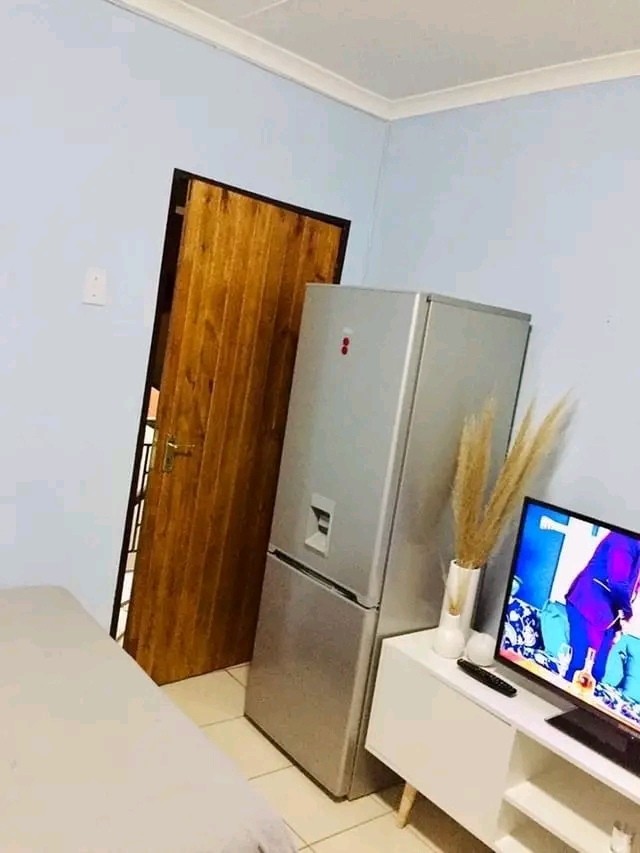 Clean bachelor room available in extension 1   in Ebony Park