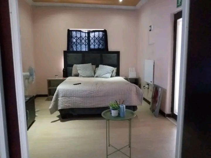 Spacious fitted bedroom with en-suiite 
shar  in Orlando East
