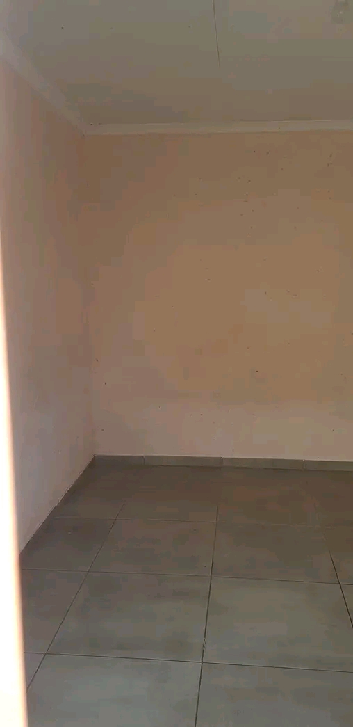 Room to rent ext 16. secured yard. shared toi  in Protea Glen