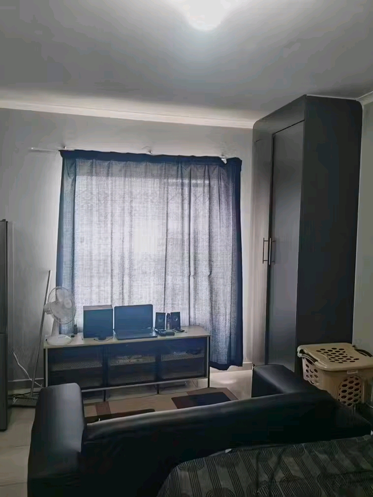 A bachelor unit(upstairs) with a small fitted  in Kempton Park
