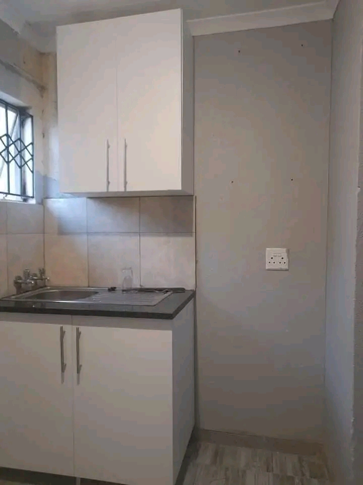 2 bedrooms with built in wardrobes
fitted ki  in Protea Glen