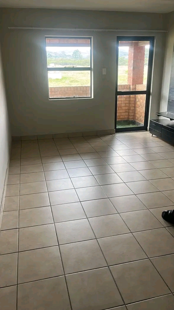 2nd floor unit
open plan lounge and fitted k  in Kibler Park