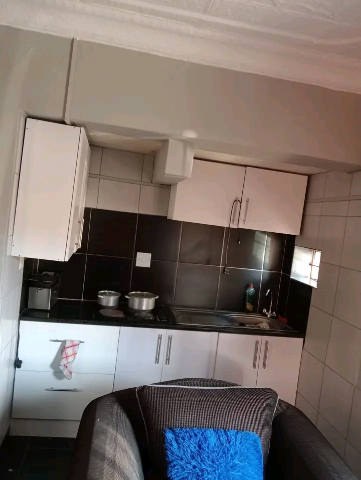 1 bedroom+ sitting room with toilet and showe  in Rosettenville